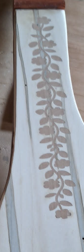 Custom floral enhancement detail on a bandura